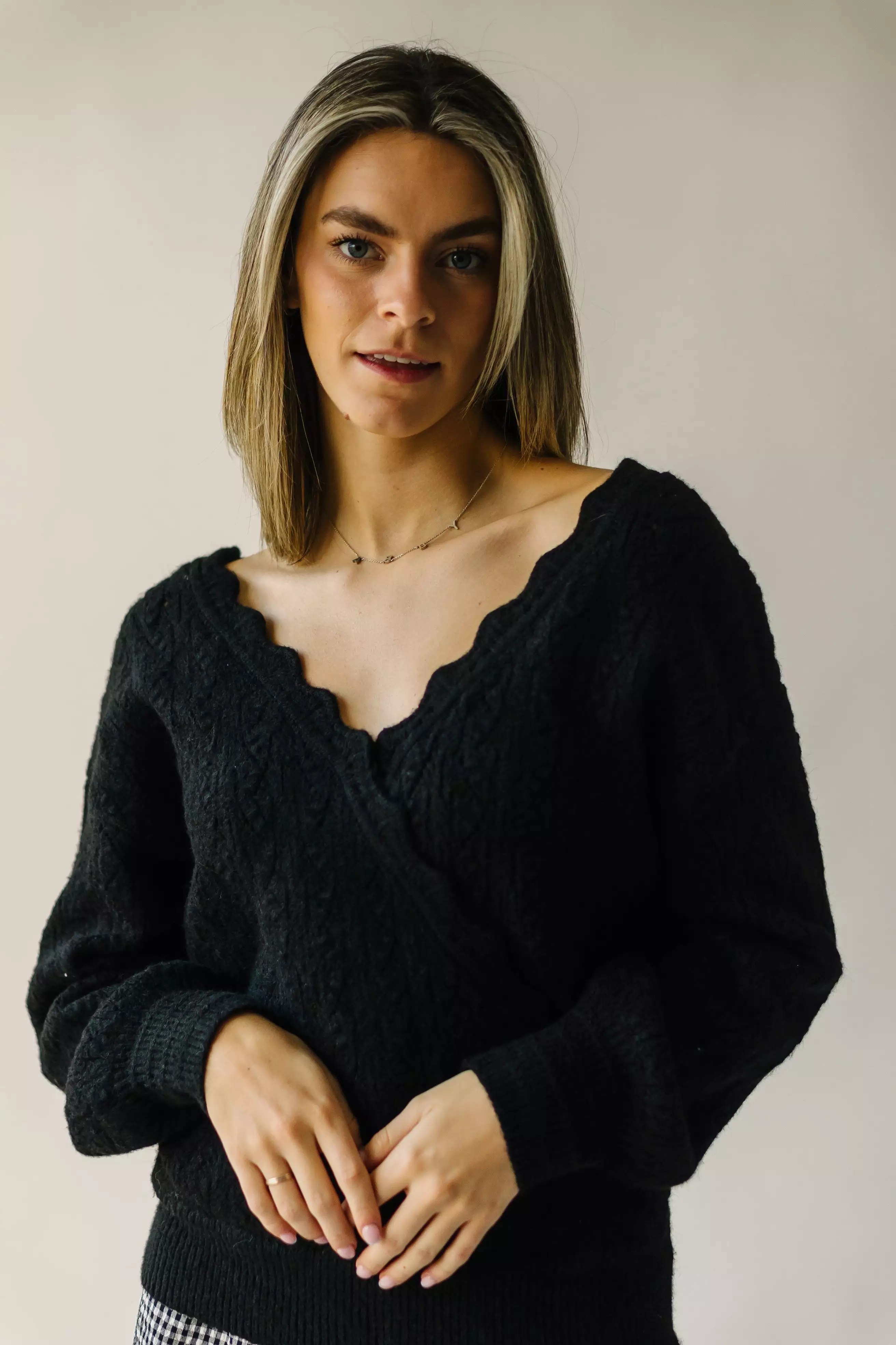 The Tagger Knit Wrap Sweater in Black