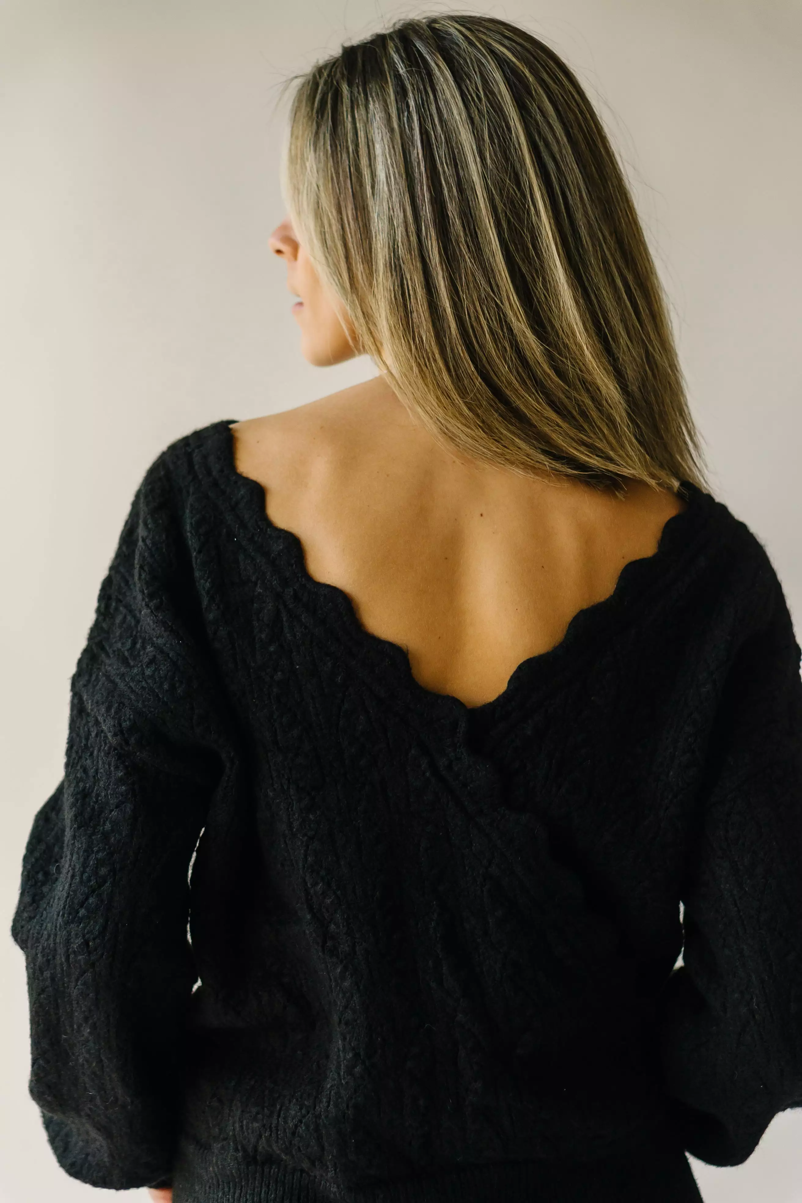 The Tagger Knit Wrap Sweater in Black